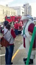  ?? Photos submitted by TRAHC ?? With holiday movies, Santa Claus, vendors, food trucks and an actual guarantee of snow falling on Main Street in front of the Perot, Saturday promises to glow with the Christmas spirit.