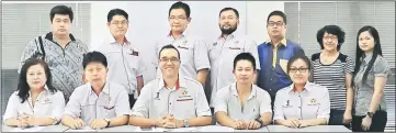  ??  ?? Chai (seated centre) with the party members after the press conference.