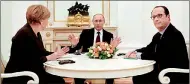  ??  ?? German Chancellor Angela Merkel, Russia's President Vladimir Putin (C) and French President Francois Hollande attend a meeting on resolving the Ukraine crisis at the Kremlin in Moscow February 6 (REUTERS)