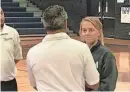  ?? JIMMY WATSON/THE TIMES ?? Airline volleyball coach Reggie Digilormo talks with an official prior to a LHSAA Division I playoff game against Comeaux.