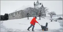  ??  ?? WINTER WORK: Snow clearing was under way in Pitlochry, Perthshire.