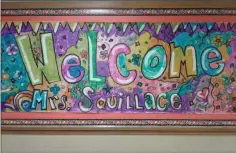  ?? MELISSA SCHUMAN - MEDIANEWS GROUP ?? A colorful mural welcomes new principal Helen Squillace to Red Mill Elementary School.