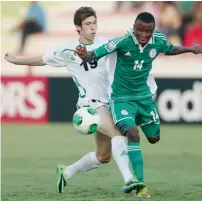  ?? AFP ?? Nigeria’s Chidiebere Nwakali and Iraq’s Mustafa Mohammed during their Fifa U-17 World Cup match in Sharjah. —