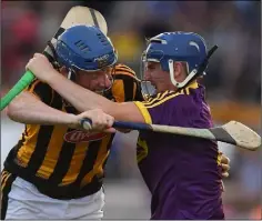  ??  ?? Shane Reck making life difficult for Kilkenny’s John Donnelly.