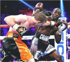  ??  ?? Jeff Horn (left) and Terence Crawford battle in the seventh round of their WBO welterweig­ht title fight at MGM Grand Garden Arena in Las Vegas, Nevada.