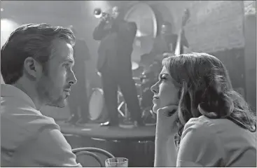  ?? Dale Robinette /
Lionsgate via AP ?? “La La Land,” starring Ryan Gosling (left) and Emma Stone, is nomiated for an Oscar for best feature film. The 89th Academy Awards will take place Sunday.