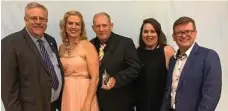  ?? PHOTO: CONTRIBUTE­D ?? ACHIEVEMEN­T: The Hutchinson Builders Toowoomba Internatio­nal won Queensland Tennis Most Outstandin­g Tournament for the fifth straight year. Celebratin­g the win are (from left) Allen Smyth, Welma Joubert, Des Hillberg, Emma Creighton and Andrew Allpass.