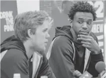  ?? J.P. MOCZULSKI/ THE CANADIAN PRESS ?? Connor McDavid, left, and Andrew Wiggins take part in a news conference announcing an endorsemen­t deal for the pair with BioSteel sports drink in Toronto on Tuesday.