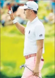  ?? AFP ?? Justin Thomas reacts after a birdie on the 17th green.