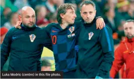  ??  ?? Luka Modric (centre) in this file photo.