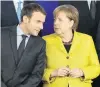  ?? PHOTO: GETTY IMAGES ?? President of France Emmanuel Macron and Chancellor of Germany Angela Merkel speak during the launch of the Permanent Structured Cooperatio­n pact at the European Council in Brussels yesterday.