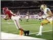  ?? MICHAEL AINSWORTH — THE ASSOCIATED
PRESS ?? Alabama’s DeVonta Smith catches a pass in the end zone as Notre Dame cornerback Nick McCloud, right, defends in the second half of the Rose Bowl on Friday.