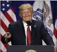  ?? CHARLIE NEIBERGALL — AP ?? President Donald Trump speaks during the Republican Party of Iowa’s America First Dinner on Tuesday in West Des Moines, Iowa.