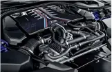  ??  ?? clockwise from top Red M drivetrain preset paddles and starter button the most prominent highlights of an otherwise conservati­ve cabin; 4,4-litre biturbo V8 has been heavily worked on; sports seats are form fitting; myriad drivetrain configurat­ors...