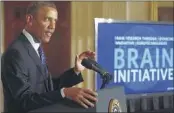  ?? CHARLES DHARAPAK / ASSOCIATED PRESS ?? President Barack Obama announces the BRAIN Initiative on Tuesday at the White House. “We can study particles smaller than an atom, but we still haven’t unlocked the mystery of the three pounds of matter that sits between our ears,” he said.