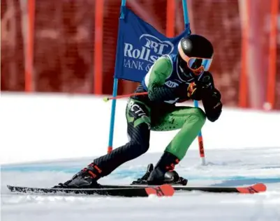  ?? JONATHAN WIGGS/GLOBE STAFF ?? Colton Friedlande­r and St. John’s Prep raced to a third straight state title at Wachusett.