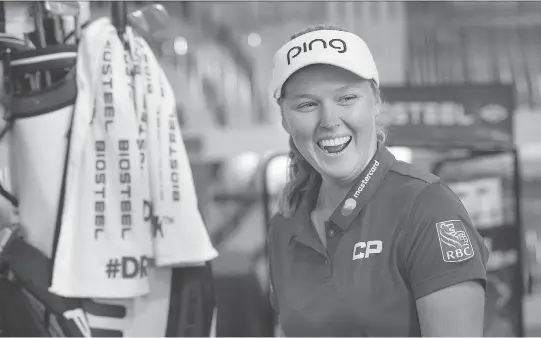  ?? PHOTOS: WAYNE CUDDINGTON ?? Hometown favourite Brooke Henderson was in good spirits for an appearance at Trainyards Golf Town ahead of next week’s Canadian Pacific Women’s Open.