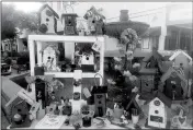  ?? LOANED PHOTO ?? BIRD HOUSES made by the Pecan Grove Garden Club are among the handcrafte­d items offered for sale at Family & Community Education’s annual bazaar in Yuma.