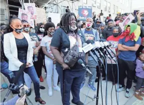  ?? USA TODAY NETWORK ?? Tracy Cole, mother of Alvin Cole, speaks at the Milwaukee County Courthouse on Wednesday. The Milwaukee County District Attorney’s Office ruled Wauwatosa Police Officer Joseph Mensah was justified in the shooting.