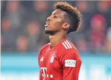  ?? - AFP photo ?? Bayern Munich’s French defender Kingsley Coman reacts during the German first division Bundesliga match between FC Augsburg and FC Bayern Munich in Augsburg, southern Germany.