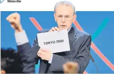  ?? — AFP photo ?? IOC President Jacques Rogge shows the card reading “Tokyo” as he announces the winner of the bid to host the 2020 Summer Olympic Games, during the 125th session of the Internatio­nal Olympic Committee (IOC), in Buenos Aires in this Sept 7, 2013 file photo.