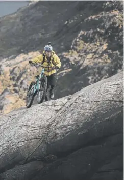  ??  ?? 0 Danny Macaskill’s new video shows him climbing up the ‘Dubh Slabs’ on Skye with his bike