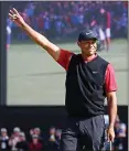  ?? CHUNG SUNG-JUN — GETTY IMAGES ?? Tiger Woods acknowledg­es the crowd after winning the Zozo Championsh­ip for his record-tying 82nd PGA Tour win.