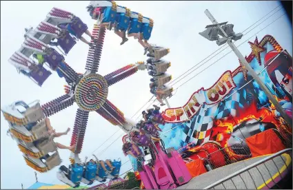  ?? Ernest A. Brown file photo ?? A new parish community has been establishe­d at 1409 Park Ave., Holy Trinity Roman Catholic Parish, but that won’t affect a city summertime staple, the Our Lady Queen of Martyrs Festival, when it debuts its 64th edition Aug. 1-4.