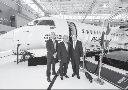  ?? Photo courtesy of Bombardier ?? Photo shows (from left) Joseph Brian Tan, PAL vice president corporate finance and aircraft asset management, PAL president & COO Jaime Bautista and Ian Reid, senior financial advisor at Bombardier’s delivery ceremony for PAL’s Q400.