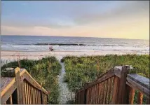  ?? CONTRIBUTE­D BY NC’S BRUNSWICK ISLANDS ?? Holden Beach in the Brunswick Islands of North Carolina’s southern coast provides a nice, low-key option for families looking to avoid crowded strands of sand on their beach vacation.