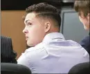  ?? DAMON HIGGINS / THE PALM BEACH POST ?? Cristian Leon, accused of impersonat­ing a police officer to obtain sexual favors, waits for his trial to start Wednesday.