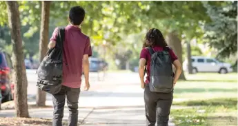  ?? ASHLEE REZIN/SUN-TIMES ?? Students arrive at Gage Park High School on CPS’ first day of school Aug. 30.