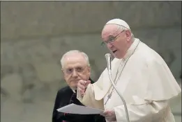  ?? ALESSANDRA TARANTINO — THE ASSOCIATED PRESS ?? Pope Francis delivers a Christmas speech during an audience with the Vatican’s employees at the Vatican on Thursday.