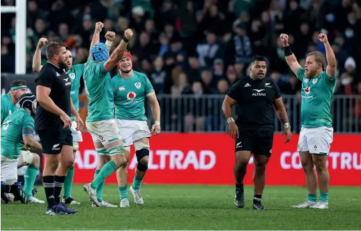  ?? GETTY IMAGES ?? Ireland players react after beating the All Blacks in Dunedin on Saturday night.