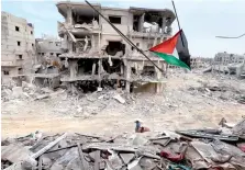  ?? ?? آثار الدمار فى غزة