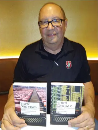  ?? ROB MIECH ?? Chris Andrews holding his first two books, which are about his career as a sportsbook director.