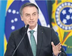  ??  ?? CLIMATE SCEPTIC: Jair Bolsonaro delivers a speech last month. Mr Bolsonaro sacked the country’s space chief over publishing untrue deforestat­ion data.