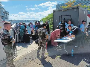  ?? | PHOTO : OUEST-FRANCE ?? Cent soixante-trois ressortiss­ants français ont pu quitter Haïti, où ils étaient bloqués par de violentes manifestat­ions.