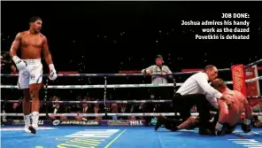  ??  ?? JOB DONE: Joshua admires his handy work as the dazed Povetkin is defeated