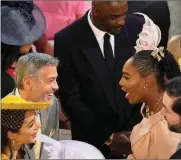  ?? Picture: Owen Humphreys/PA via AP ?? CELEBRITIE­S: George Clooney greets Serena Williams in St George’s Chapel at Windsor Castle for the wedding of Prince Harry and Meghan Markle. In the foreground are Amal Clooney (left) and Alexis Ohanian. In the background is Idris Elba.