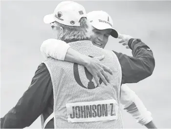  ?? FILE PHOTO BY IAN RUTHERFORD, USA TODAY SPORTS ?? American Zach Johnson, right, was 39 when he won the British Open in 2015.