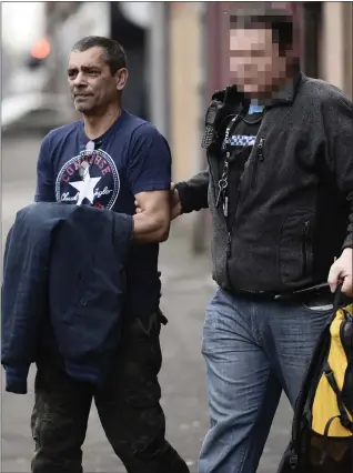  ?? Picture: Jamie Simpson ?? Vojtech Gombar is arrested following raids on properties in Govanhill