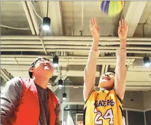  ?? PROVIDED TO CHINA DAILY ?? A child with autism plays basketball in Shanghai on Sunday.