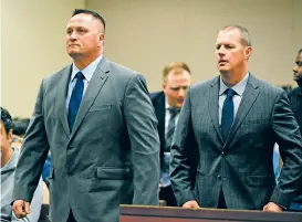  ?? ANDY CROSS/ASSOCIATED PRESS FILE PHOTO ?? Paramedics Jeremy Cooper, left, and Peter Cichuniec attend an arraignmen­t earlier this year at the Adams County Justice Center in Brighton, Colo. Jury selection in the paramedics’ trial is set to begin Monday.