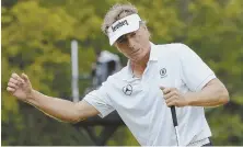  ?? AP PHOTO ?? BIG FINISH: Winner Bernhard Langer watches his putt on the 18th green during the Senior PGA Championsh­ip.