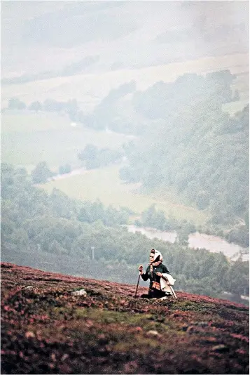  ?? ?? The late Queen loved the peace she found in the wilds of the Scottish hills, as seen in this previously unseen photograph taken in 1971