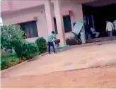 ??  ?? A video grab of students carrying the trunk boxes containg old SSC question papers.