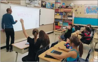  ?? NEWS PHOTO JEREMY APPEL ?? Neermal Hosanee teaches math to his Grade 6 class at Ecole Connaught School.