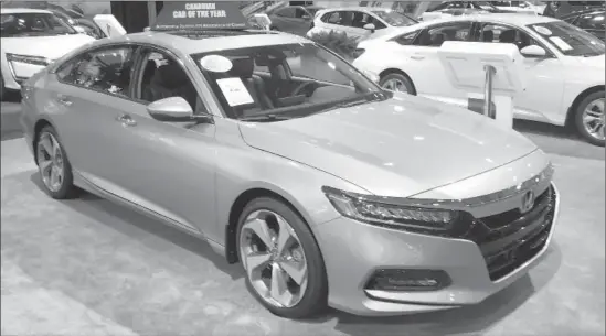  ??  ?? The 2018 Honda Accord was named Car of the Year by the Automobile Journalist­s Associatio­n of Canada (AJAC).