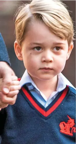  ??  ?? Target? Prince George in uniform on his first day at school